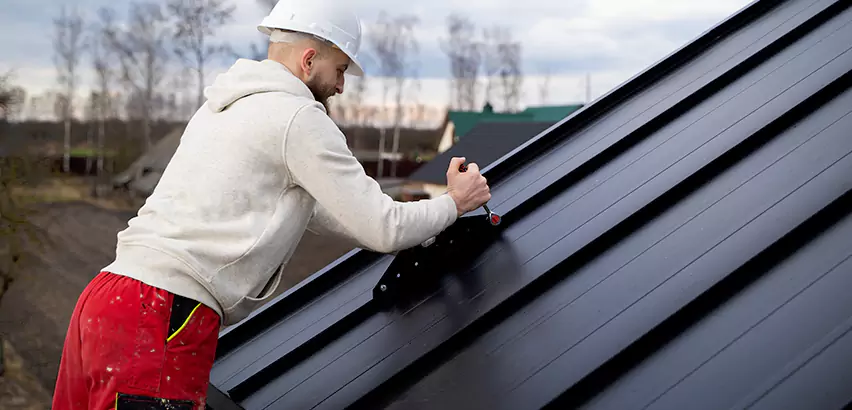 Tin Roof Ridge Cap Installation in Tuckahoe